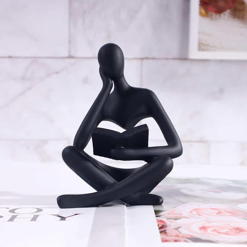 Abstract Little Man Reading Book Sculpture